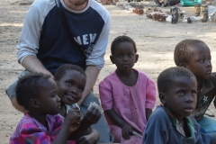 Matobo - Chris with the Children